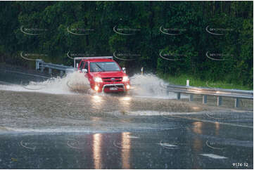 Flooded Road with 4WD QLD Aerial Photography