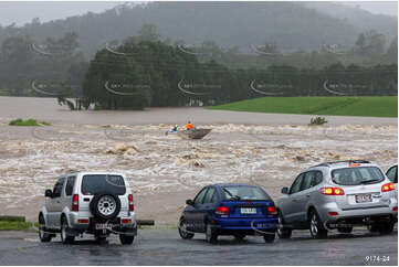 Flooded Road with 4WD QLD Aerial Photography