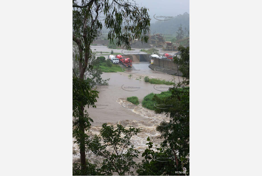 Flooded Road with 4WD QLD Aerial Photography