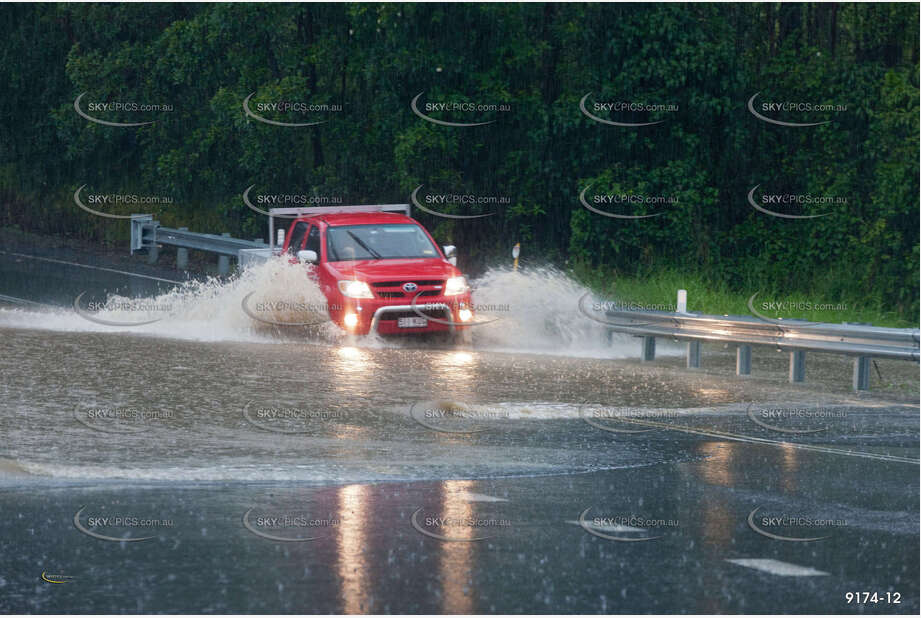 Flooded Road with 4WD QLD Aerial Photography