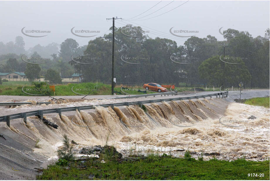 Flooded Road with 4WD QLD Aerial Photography