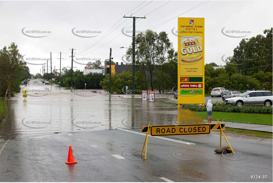 Flooded Road with 4WD QLD Aerial Photography